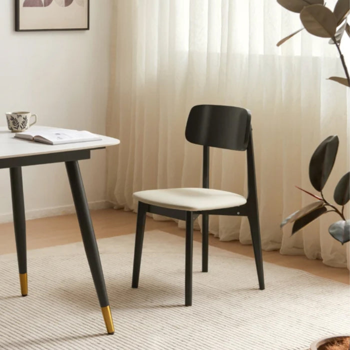 Andover Minimalist Black Dining Chair with Curved Backrest and Solid Wood Legs