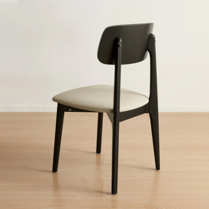 Andover Minimalist Black Dining Chair with Curved Backrest and Solid Wood Legs