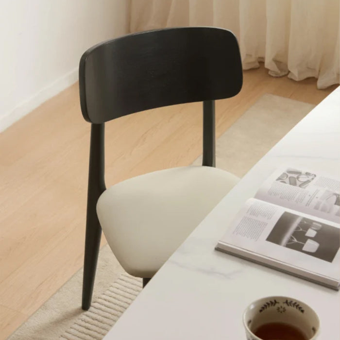 Andover Minimalist Black Dining Chair with Curved Backrest and Solid Wood Legs