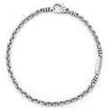 Sterling silver fluted links form this 3mm double link chain bracelet.