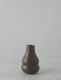 #color::brown | Despina curved vase.
