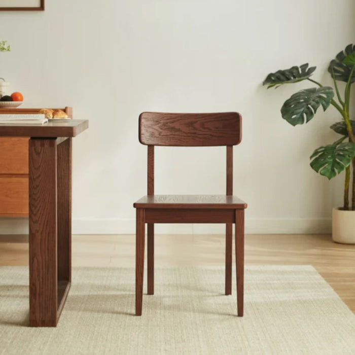Edele Walnut Color Solid Timber Dining Chair with Subtle Curved Backrest