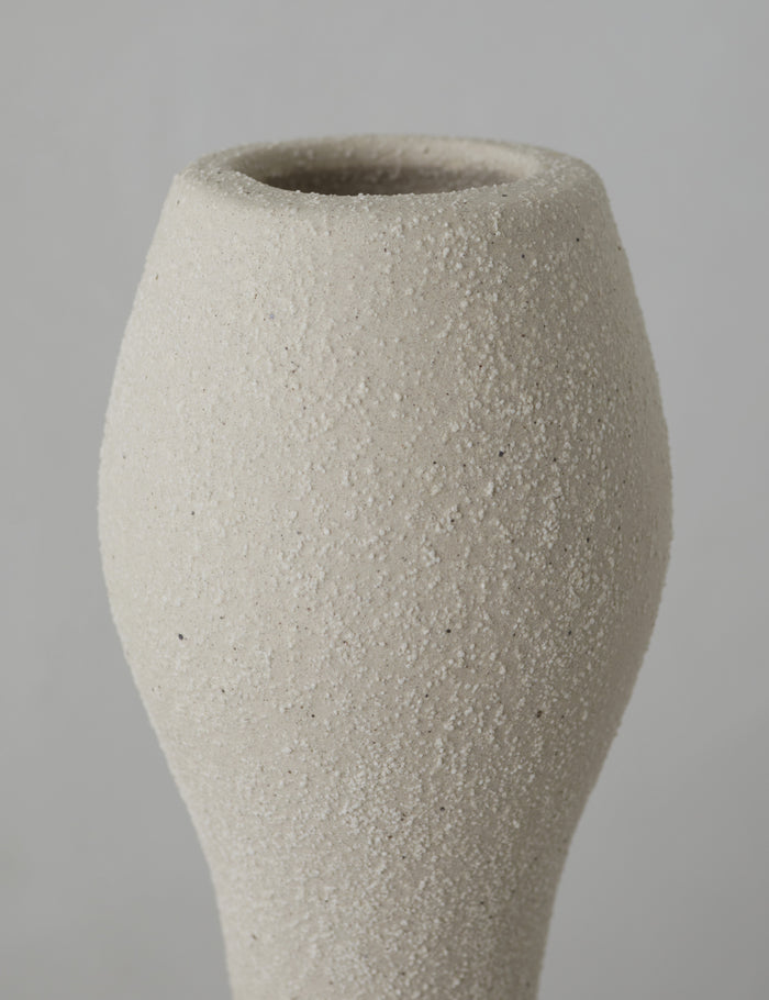 #color::natural | Kian textured ceramic narrow hourglass vase.