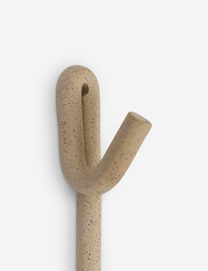 #color::speckled | Close-up of the Cream speckled pattern on the Leggy Long Wall Hook by SIN Ceramics