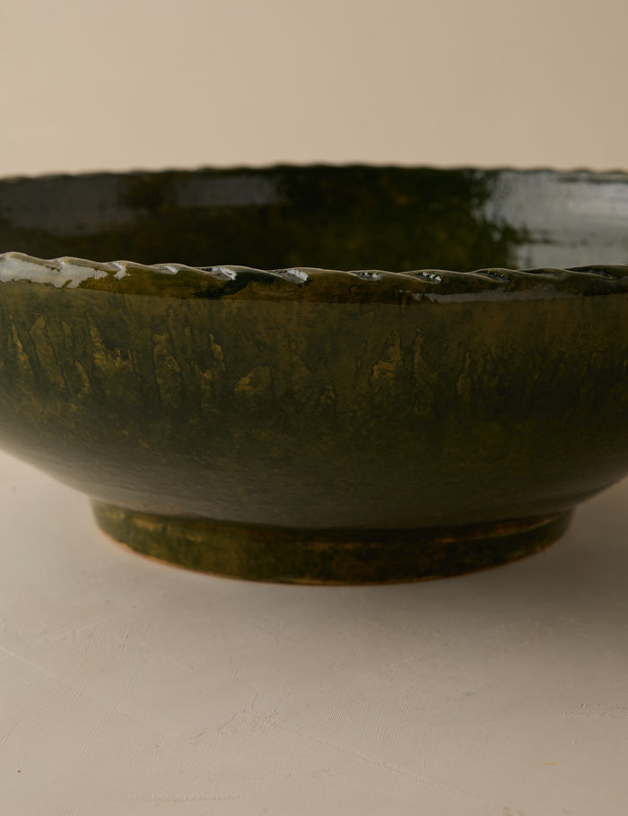 #color::green | Close up of the Peony green textural terracotta decorative bowl by Heidi Caillier.