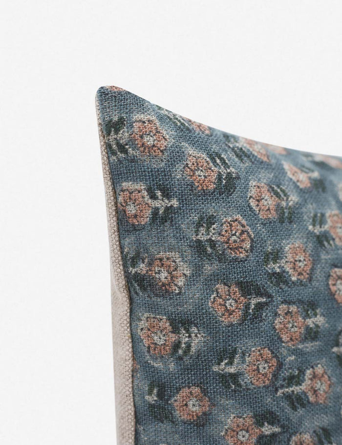 #size::13--x-20- | Corner-shot of the Tamra blue and pink lumbar pillow with floral patterns